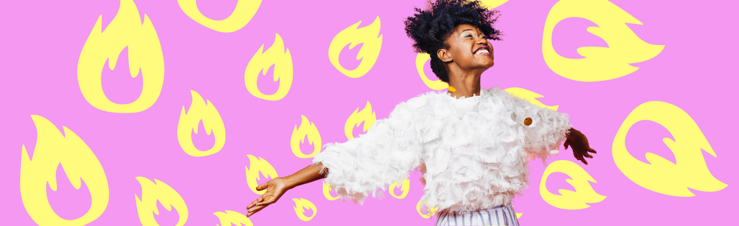 Woman smiling against solid pink background with yellow flames