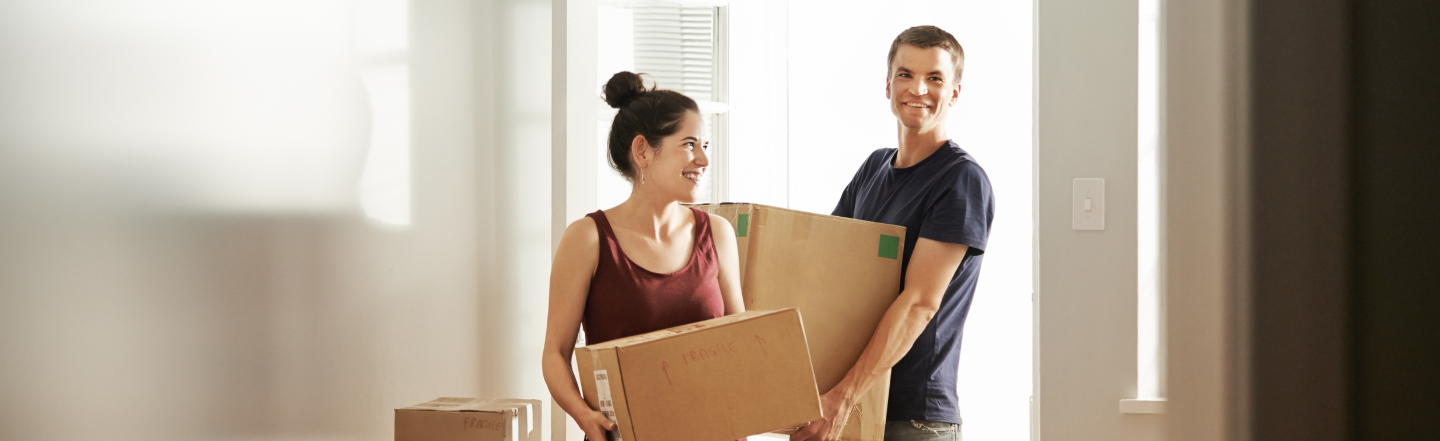 Two people moving into their first home together 