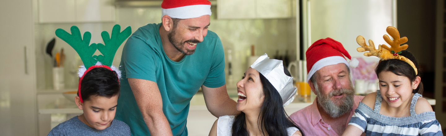 Family celebrating a budget friendly Christmas at home 
