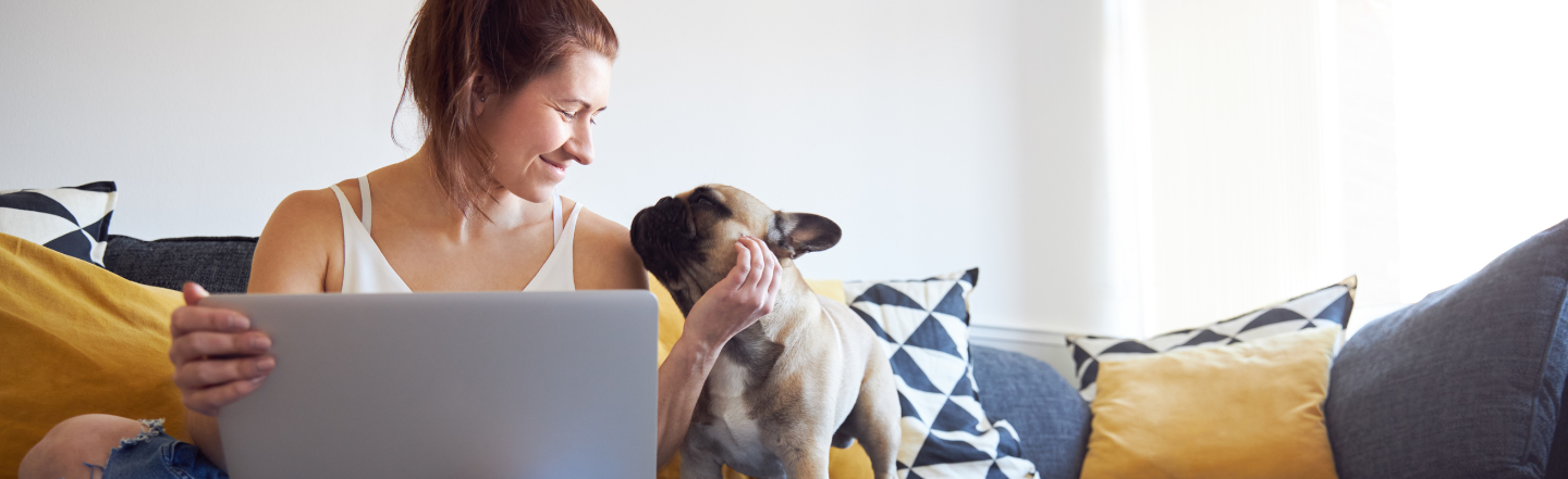 Woman with dog on couch