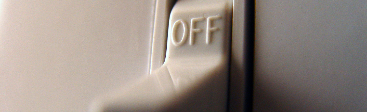 Close up of light switch in off position as September 2024 Beforepay Cost of Living shows increase in utilities spending.